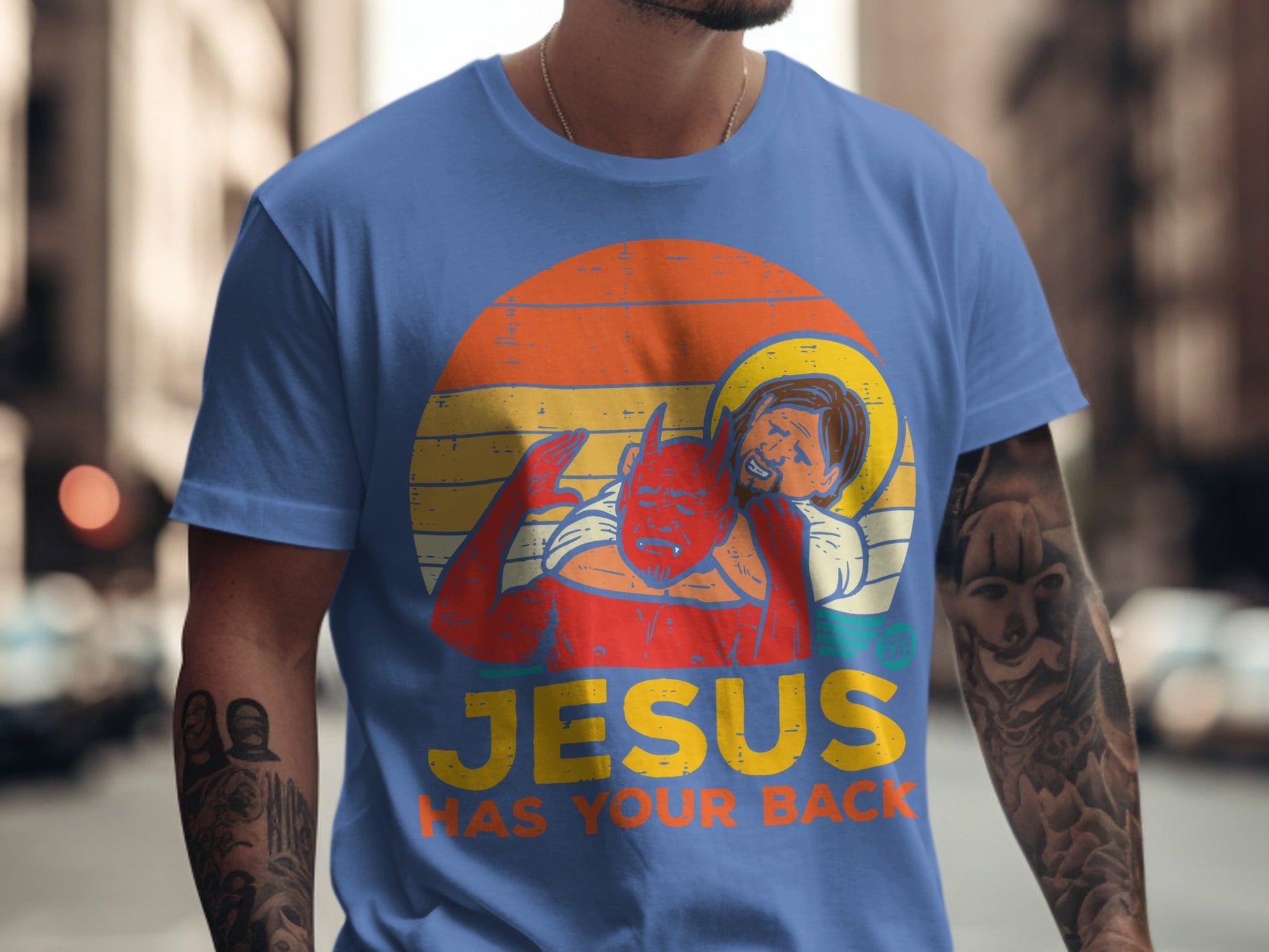 Jesus with devil on shoulder, sunset graphic, text "JESUS HAS YOUR BACK".