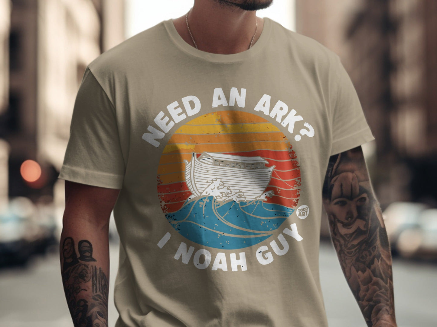 T-shirt with "Need an Ark? I Noah Guy" and a ship on waves.