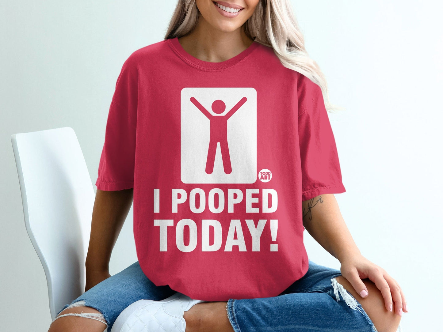 Red t-shirt with a white stick figure design and text "I POOPED TODAY!"
