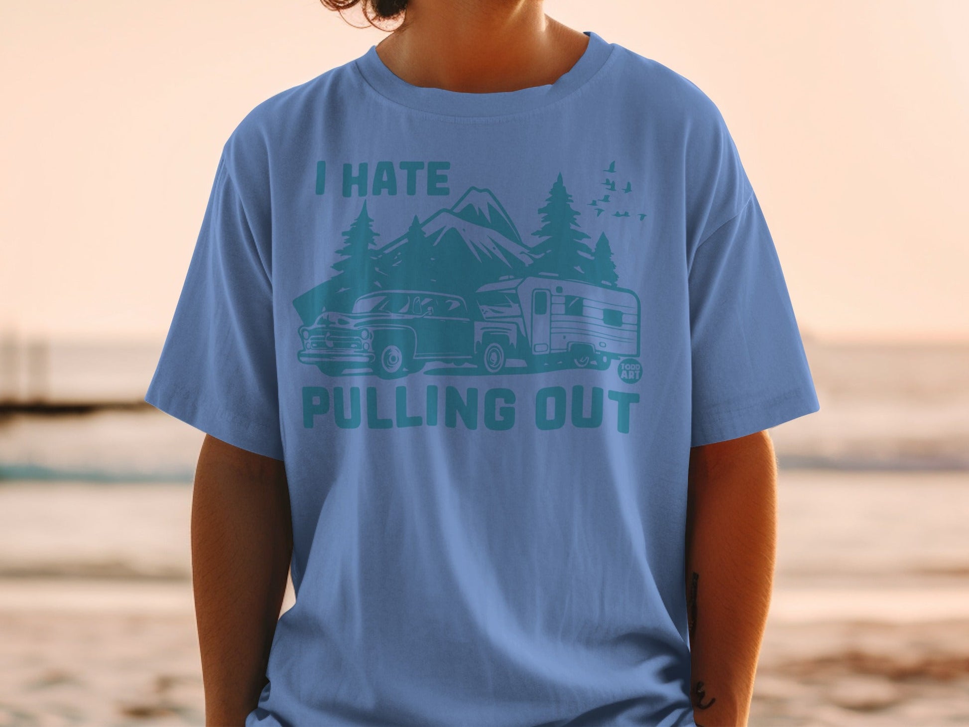 T-shirt with vintage car, camper, mountains, and text "I HATE PULLING OUT".