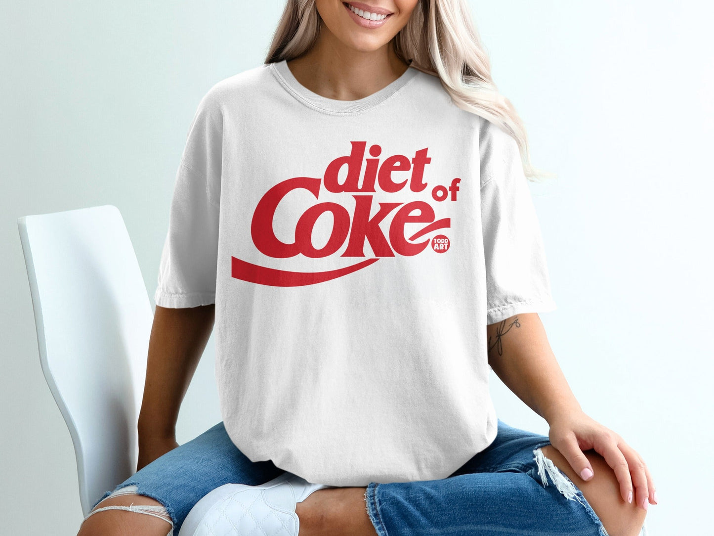 White t-shirt with red "diet Coke" logo and "1992 Art" text.