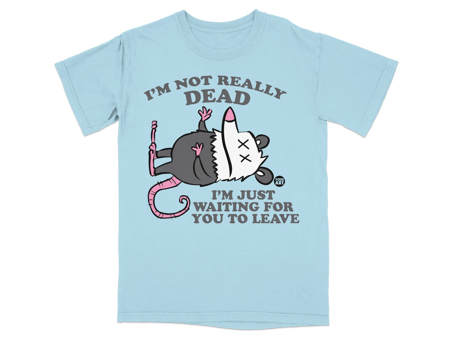 Light blue t-shirt with a cartoon opossum playing dead and text "I'm not really dead, I'm just waiting for you to leave."