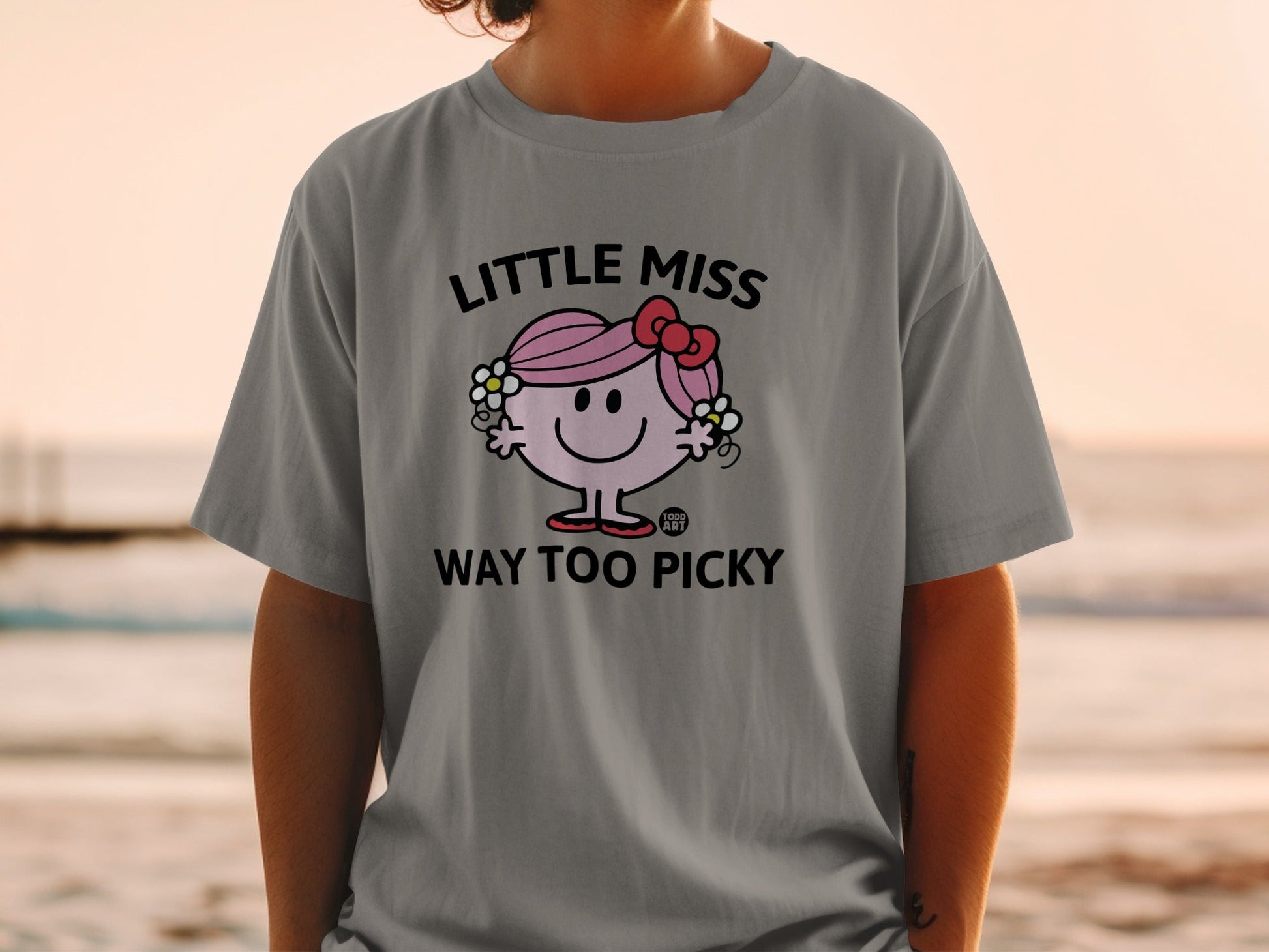 Little Miss Too Way Picky graphic tee with bow and text.