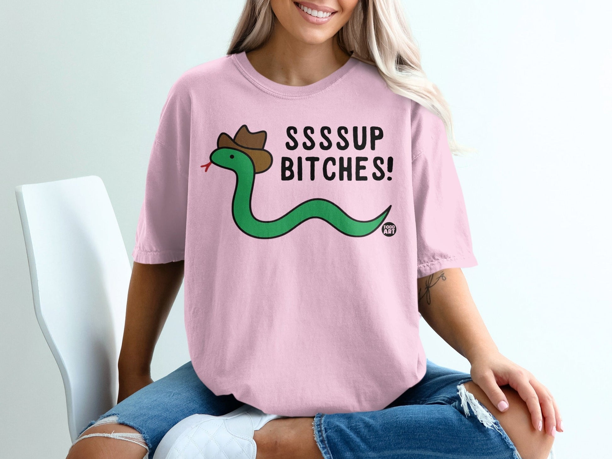 Green snake wearing a cowboy hat, with text "SSSSUP BITCHES!"
