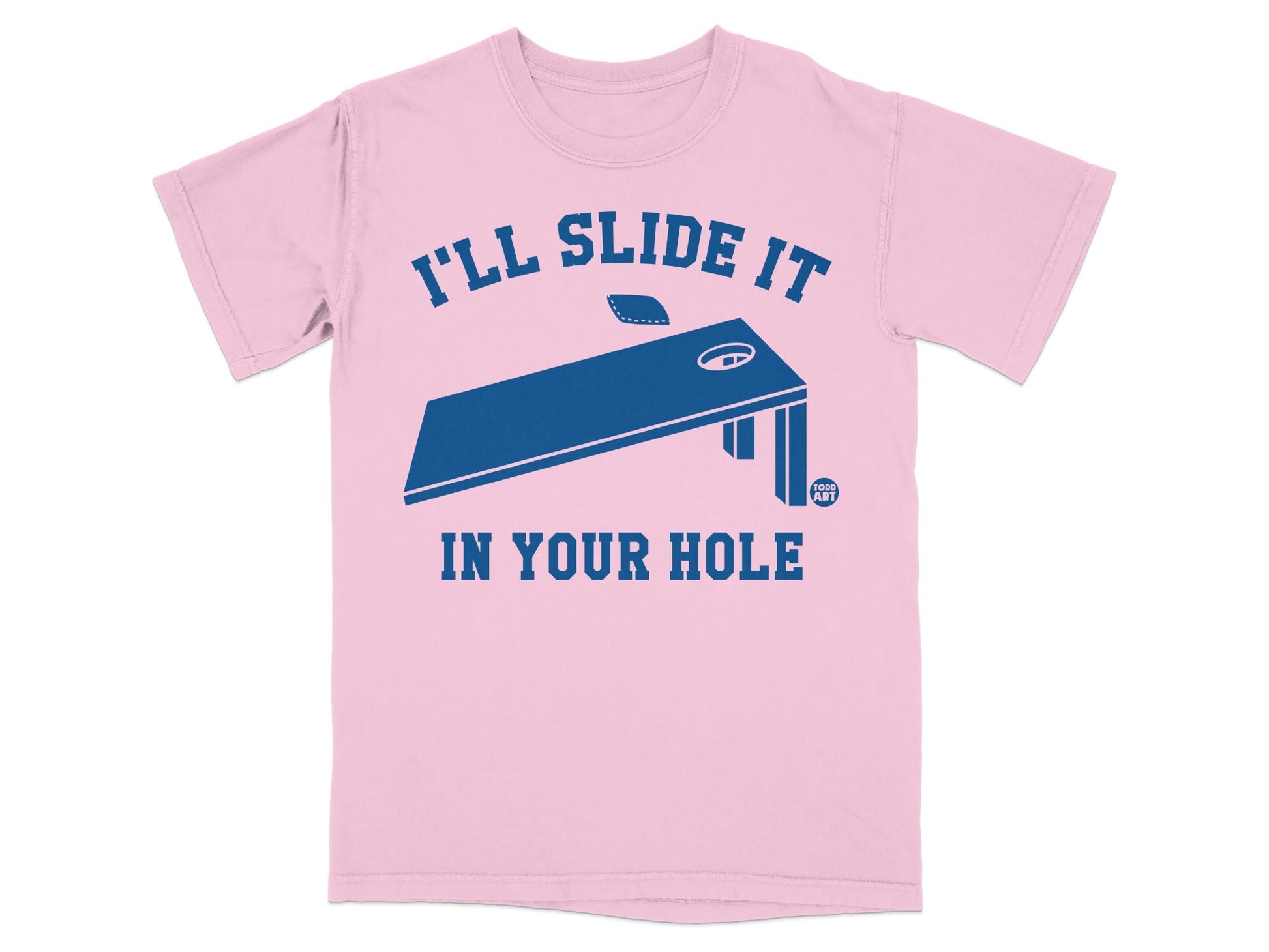 Pink t-shirt with blue cornhole board graphic and text "I'LL SLIDE IT IN YOUR HOLE".