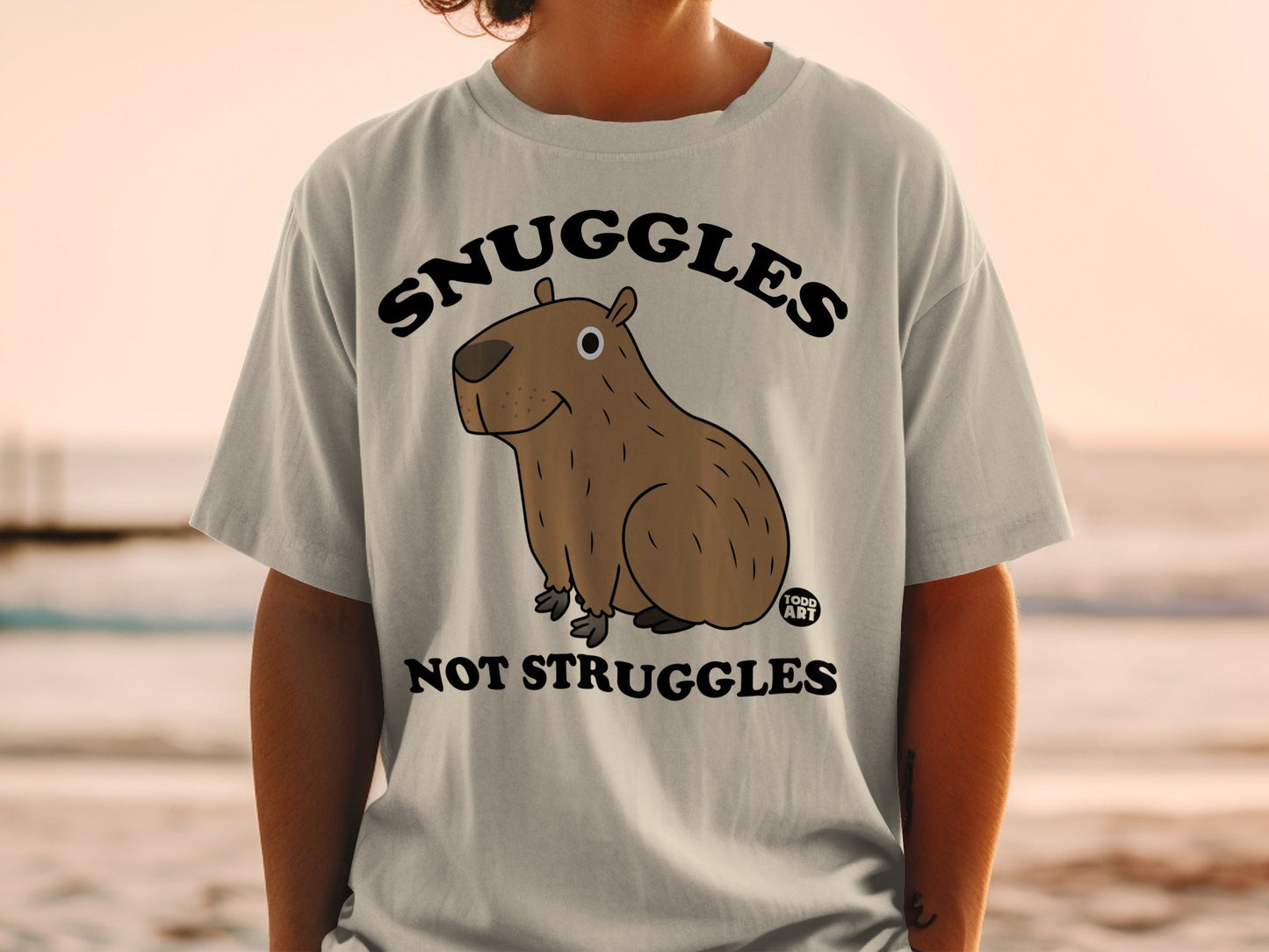 Snuggles Not Struggles Cartoon Capybara T-shirt