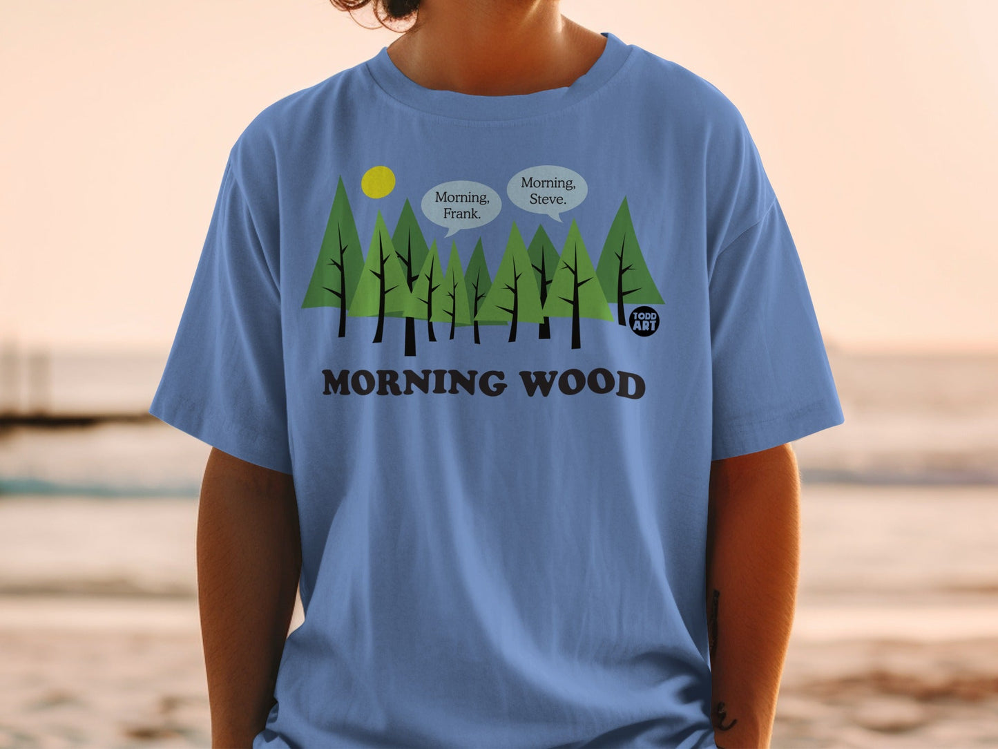 Blue t-shirt with "MORNING WOOD" text and cartoon trees with dialogue.