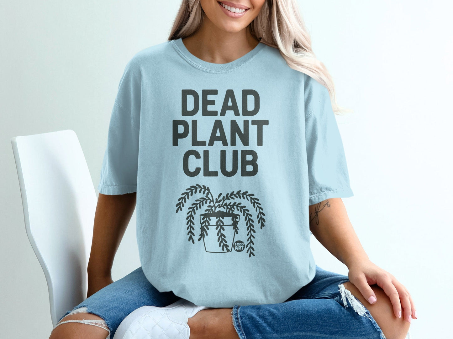 Light blue t-shirt with "DEAD PLANT CLUB" and potted plant graphic.