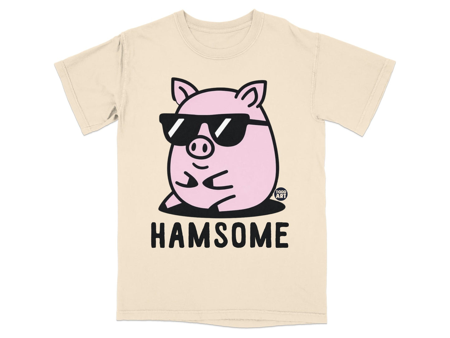 Pink pig wearing sunglasses on a beige t-shirt with "HAMSOME" text.