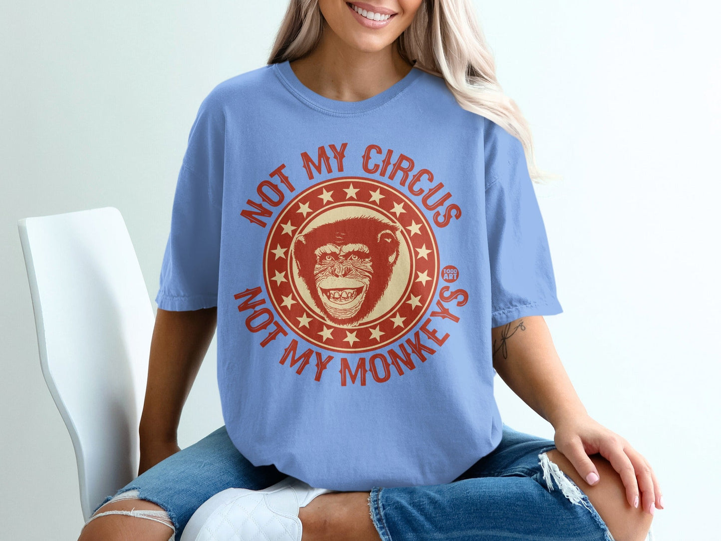 Light blue t-shirt with "NOT MY CIRCUS NOT MY MONKEYS" and a monkey graphic.