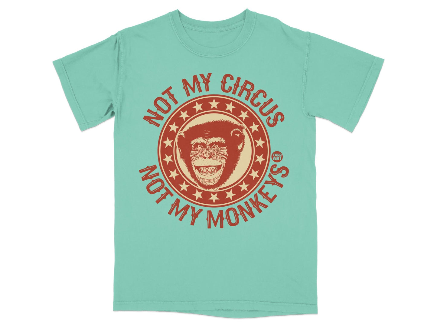 Teal t-shirt with circular graphic saying "NOT MY CIRCUS NOT MY MONKEYS".