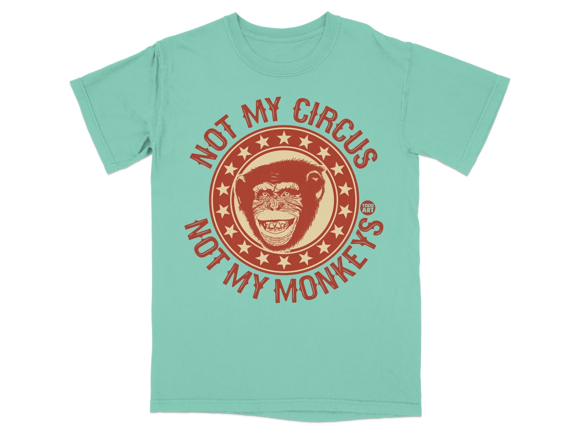 Teal t-shirt with circular graphic saying "NOT MY CIRCUS NOT MY MONKEYS".