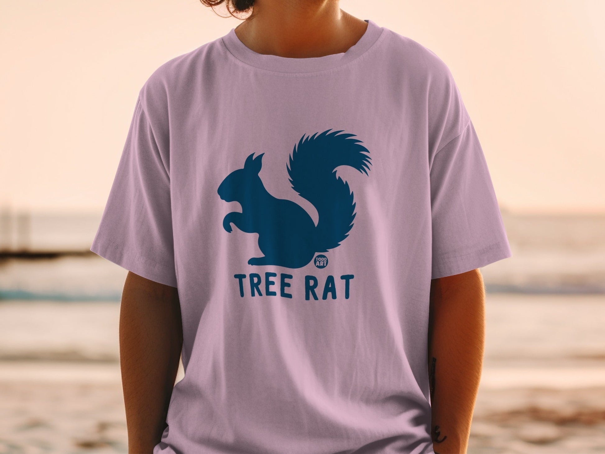 Purple t-shirt with a blue squirrel silhouette and "TREE RAT" text.