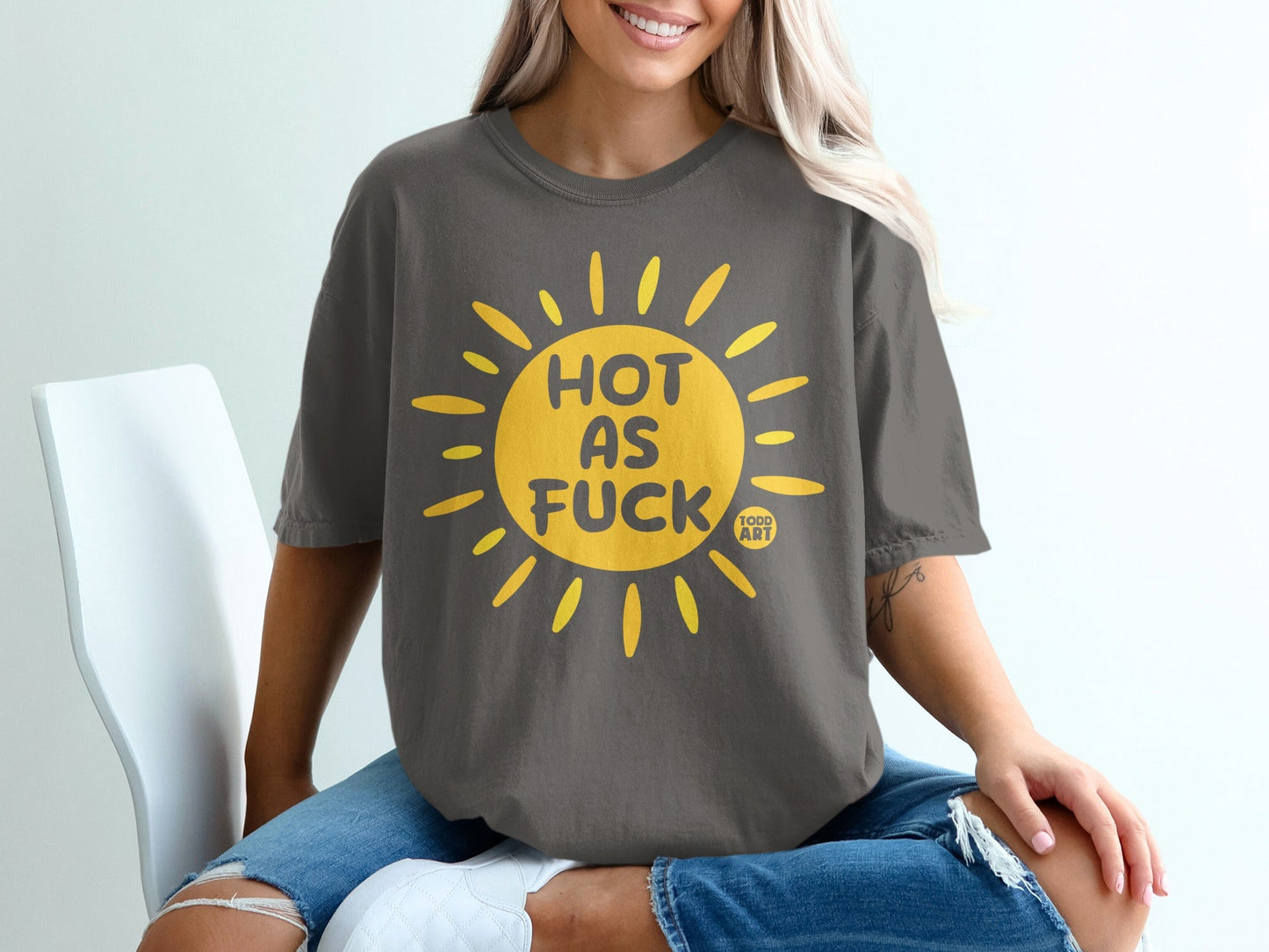 Dark gray t-shirt with yellow sun graphic and "HOT AS FUCK" text.
