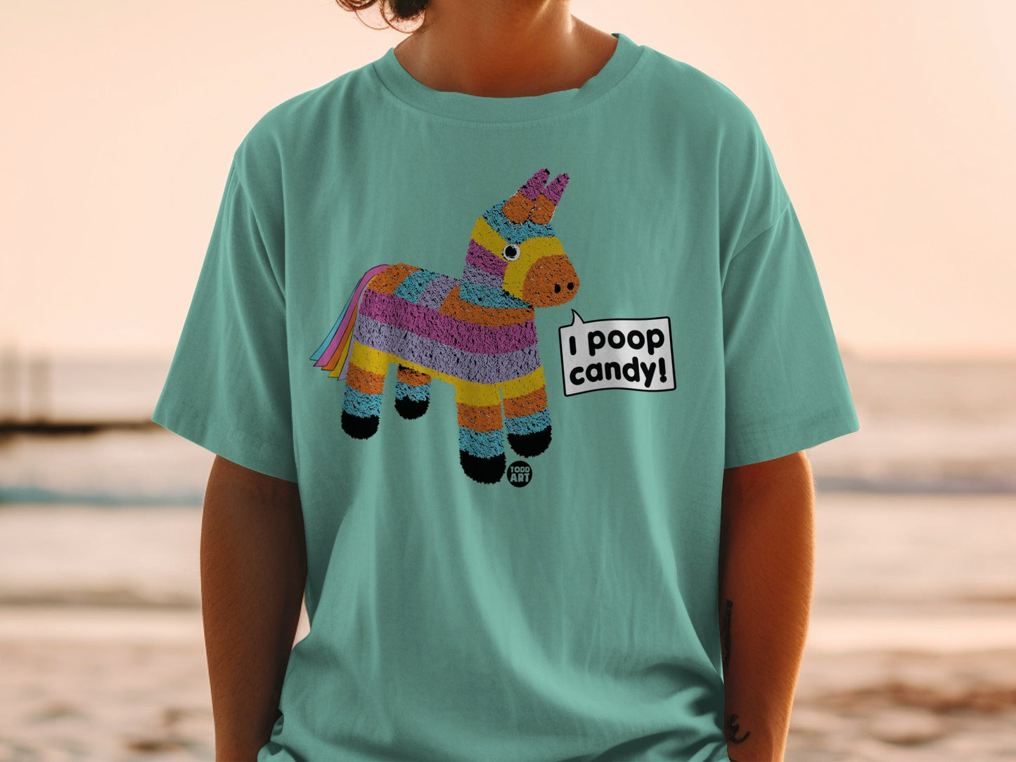 Teal t-shirt with a colorful pinata graphic that says "I POOP CANDY!"