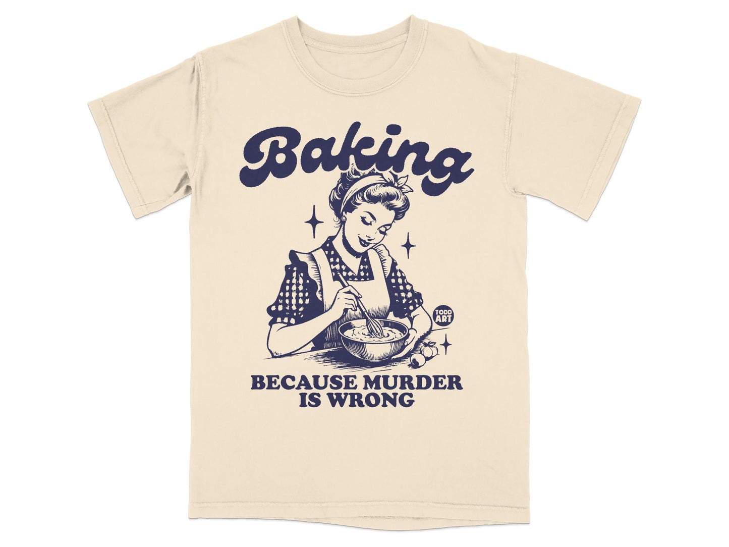 Cream t-shirt with "Baking Because Murder Is Wrong" and a woman baking.