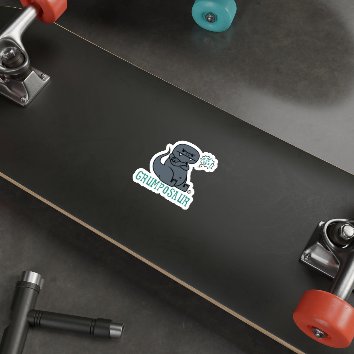 Grumposaur Sticker on Black Skateboard Deck product