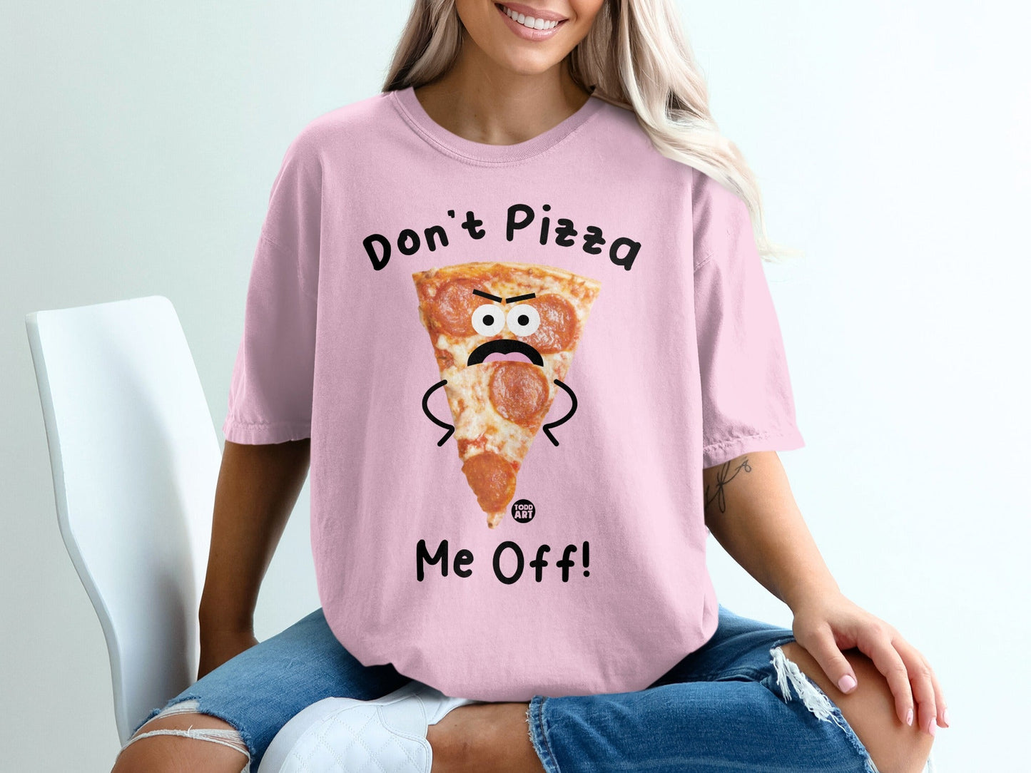 Pink t-shirt with a sad pizza slice graphic and text "Don't Pizza Me Off!".