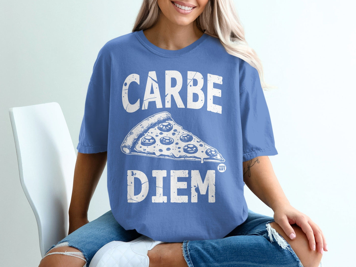 Blue t-shirt with distressed "CARPE DIEM" text and pizza slice graphic.