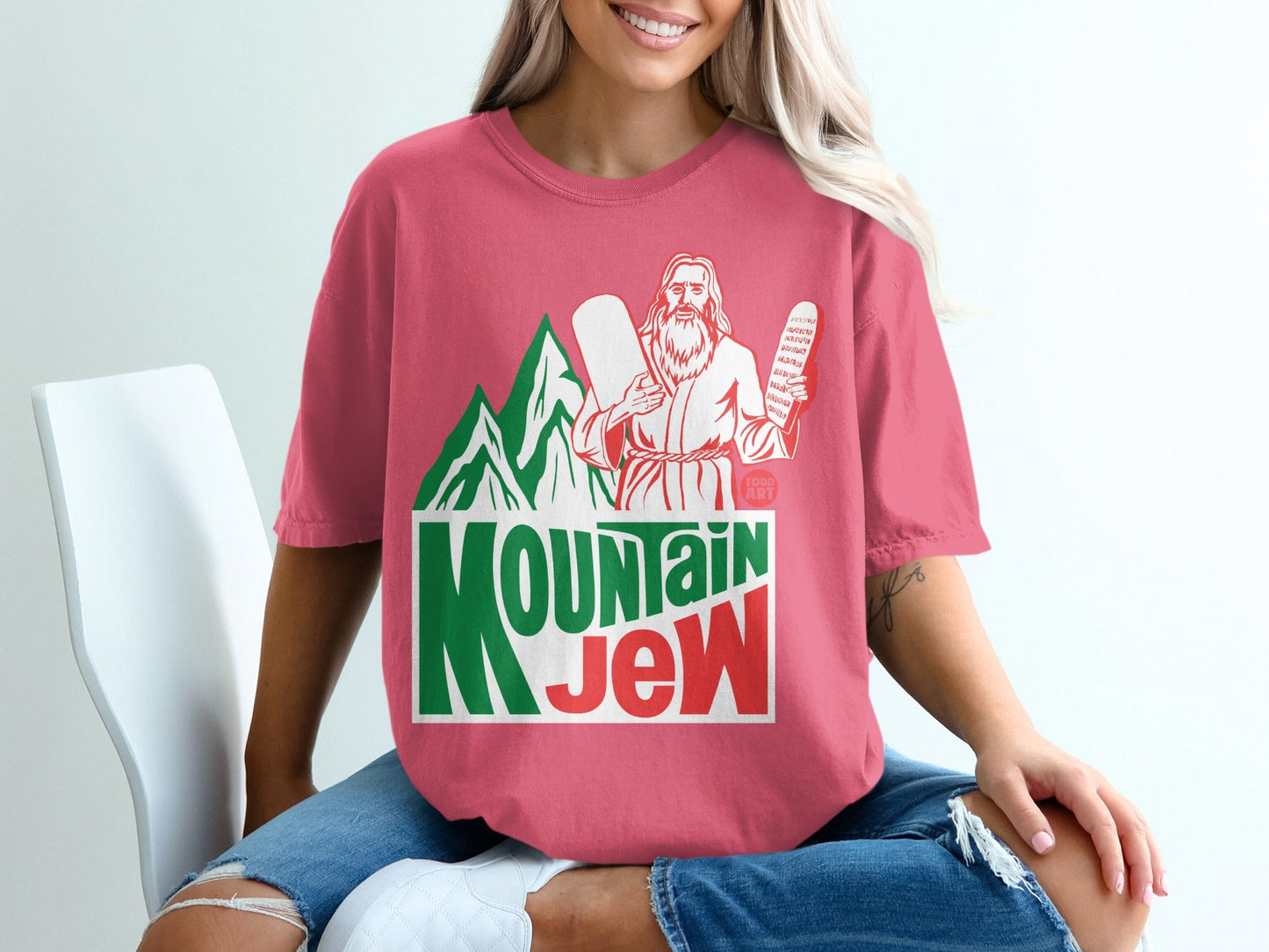 T-shirt with "MOUNTAIN JEW" text and religious symbols.
