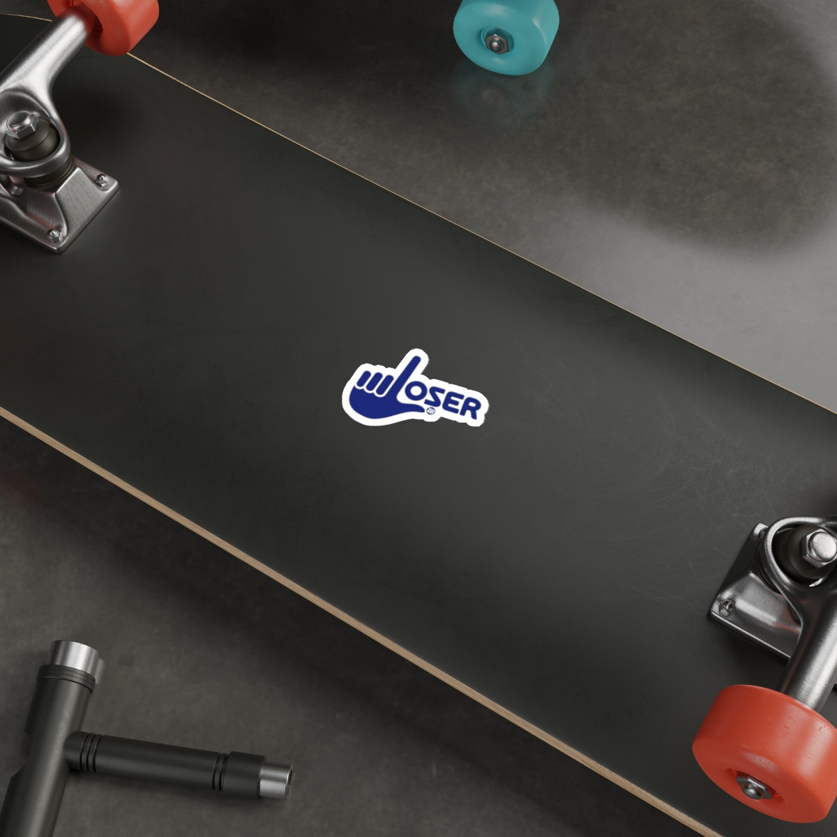 Black Skateboard with Blue Loser Sticker Skateboard