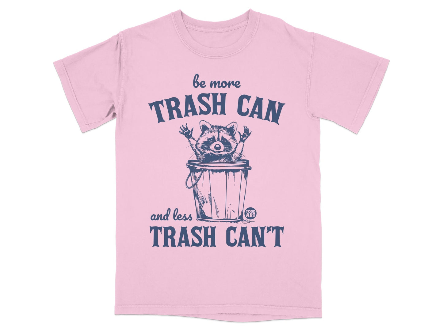 Pink t-shirt with raccoon in trash can saying "be more TRASH CAN and less TRASH CAN'T".