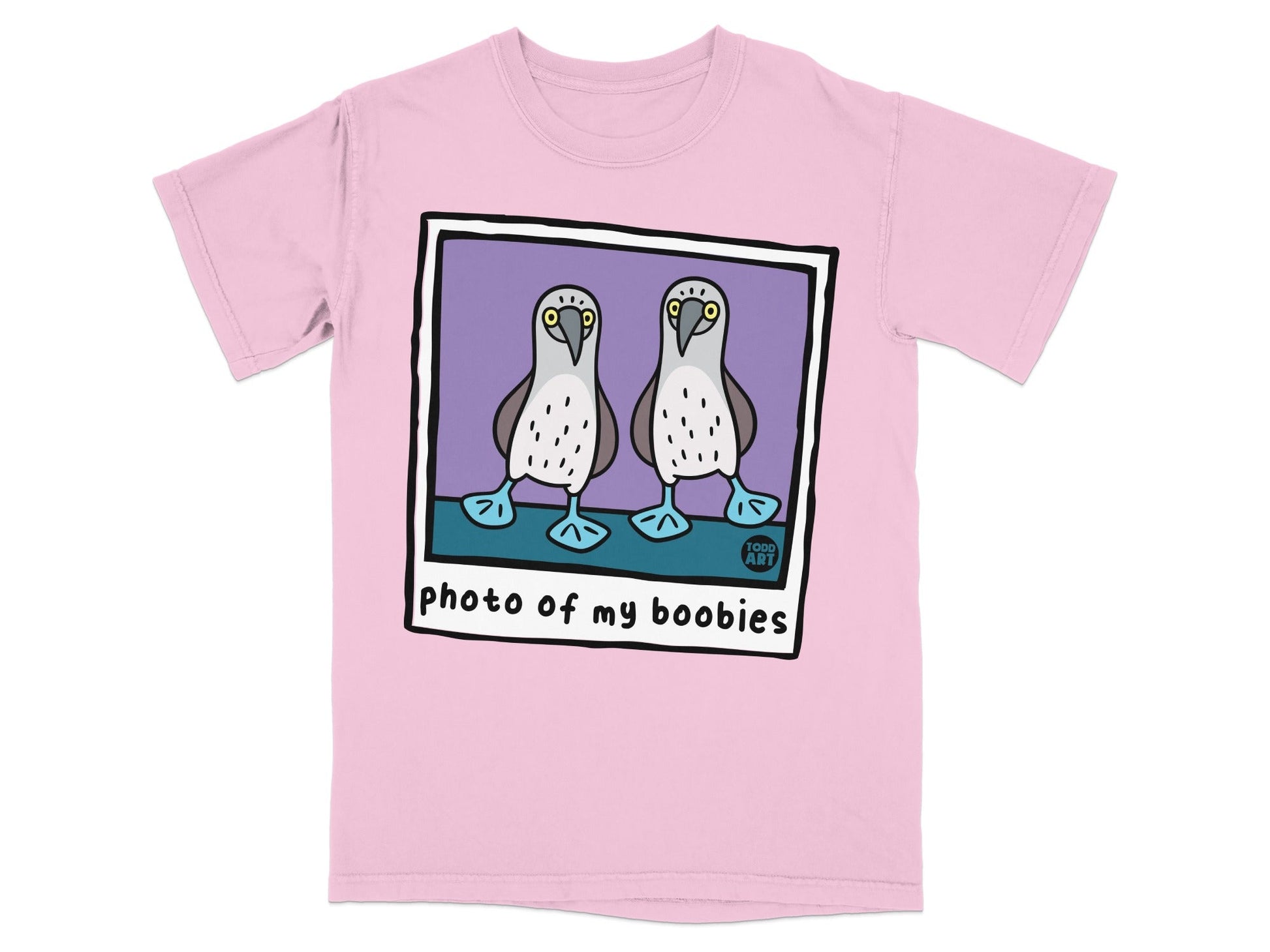 Pink t-shirt with two blue-footed booby birds on a purple background.