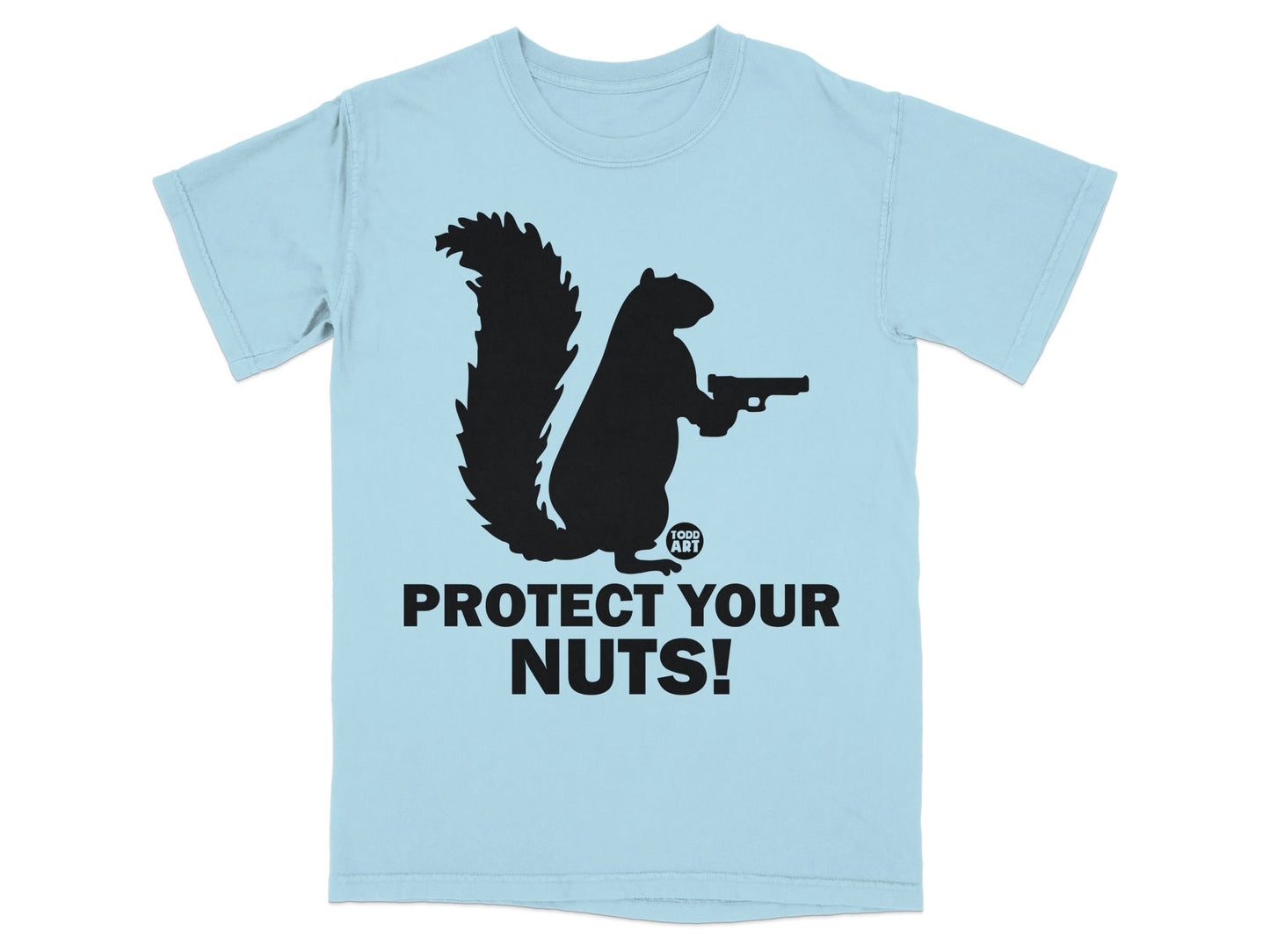 Light blue t-shirt with black silhouette of a squirrel holding a gun, text reads "PROTECT YOUR NUTS!"