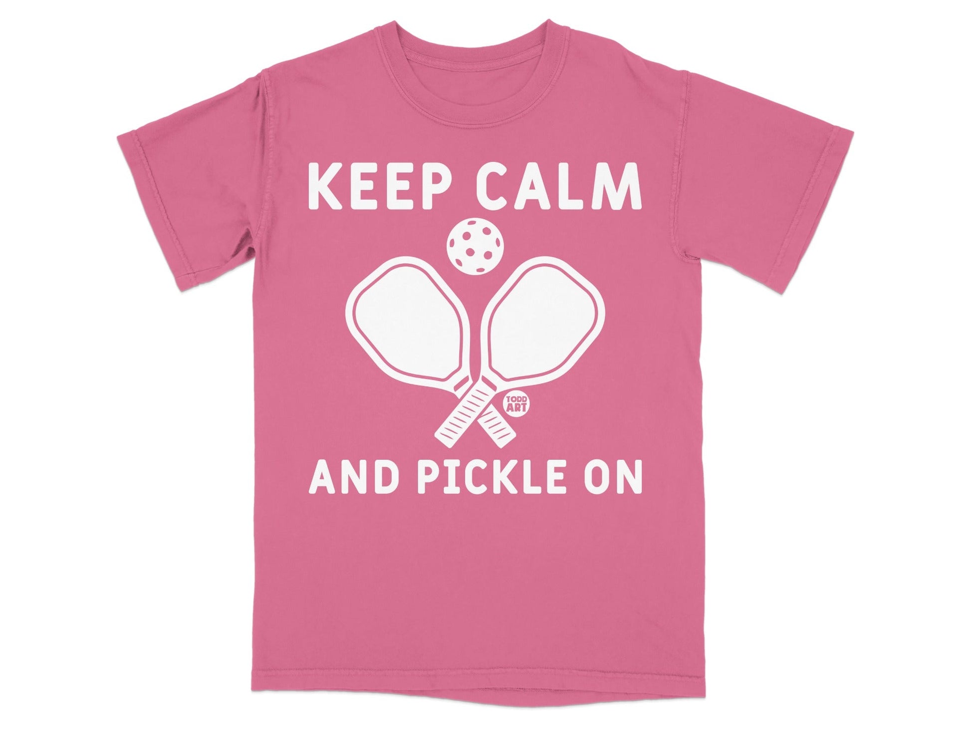 Pink t-shirt with "KEEP CALM AND PICKLE ON" and pickleball graphic.