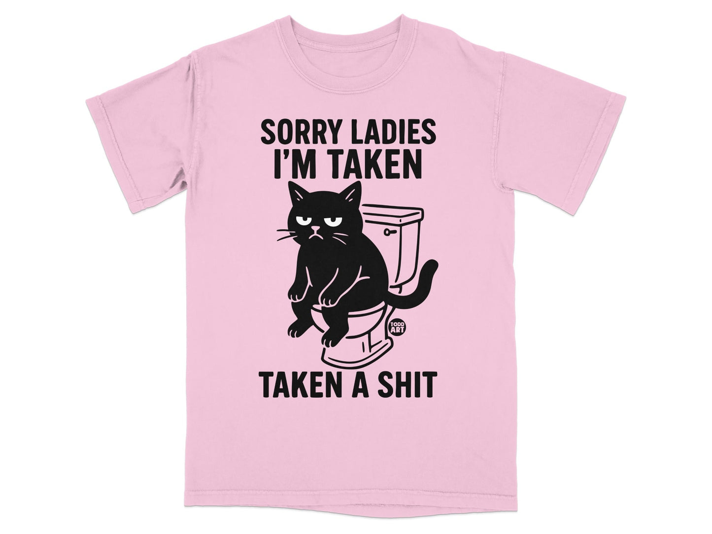 Pink t-shirt with a grumpy cat sitting on a toilet, text says "SORRY LADIES I'M TAKEN" and "TAKEN A SHIT".