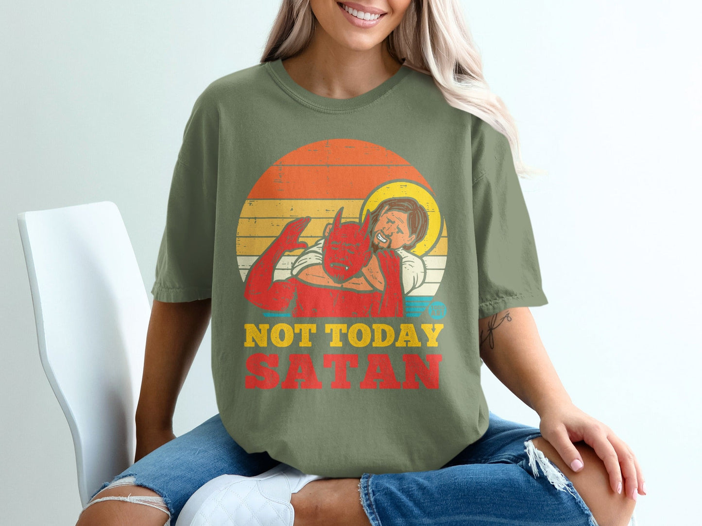 Olive t-shirt with "NOT TODAY SATAN" graphic depicting Jesus pushing away the devil.