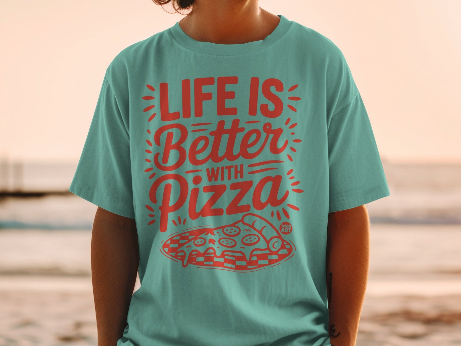 Teal t-shirt with "Life is Better with Pizza" and pizza slice graphic.