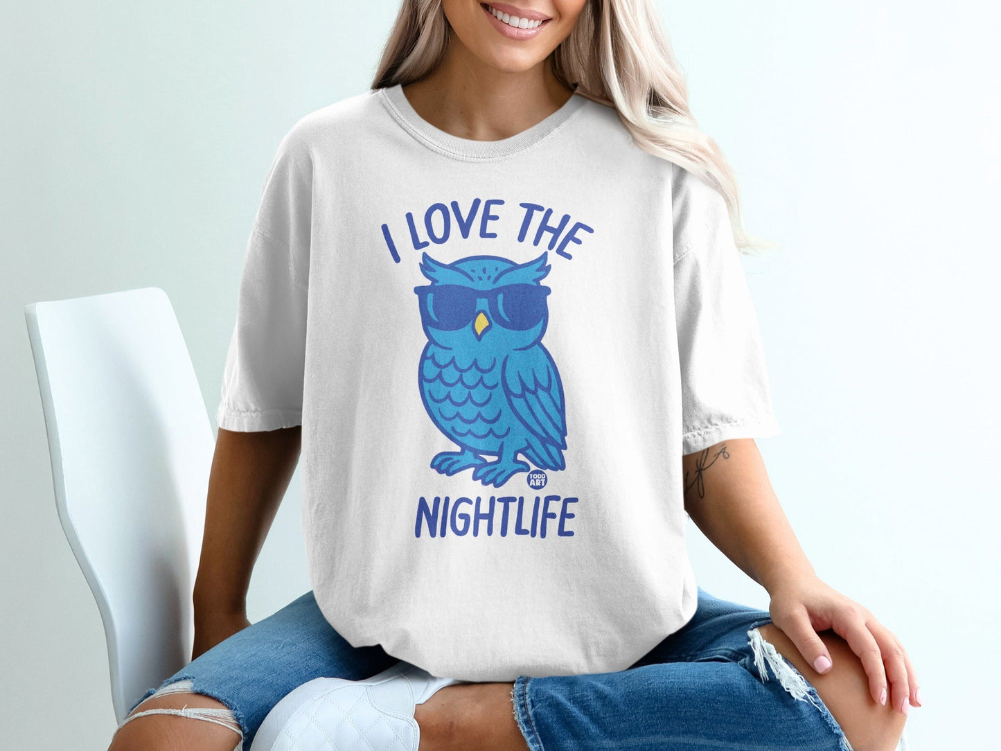 Blue cartoon owl wearing sunglasses, "I love the nightlife" text.