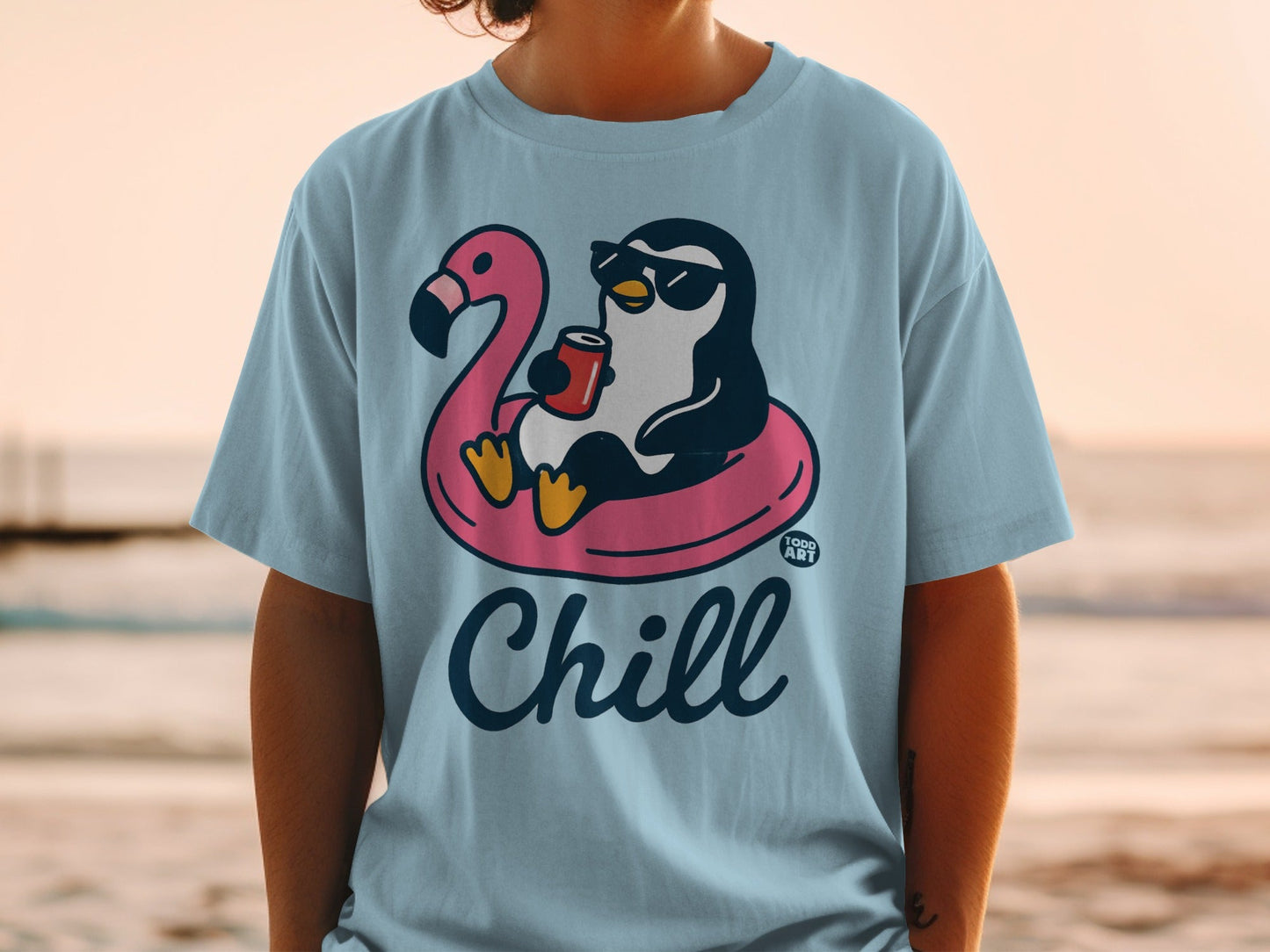 Penguin in sunglasses floats on flamingo pool float, holding drink.