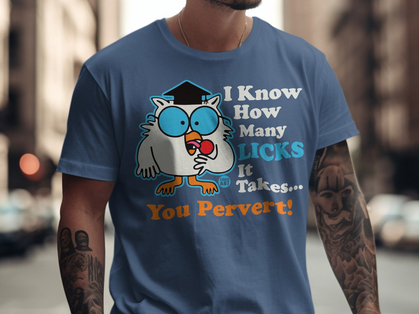 T-shirt with an owl wearing a graduation cap, holding a lollipop. Text says "I Know How Many Licks It Takes... You Pervert!".