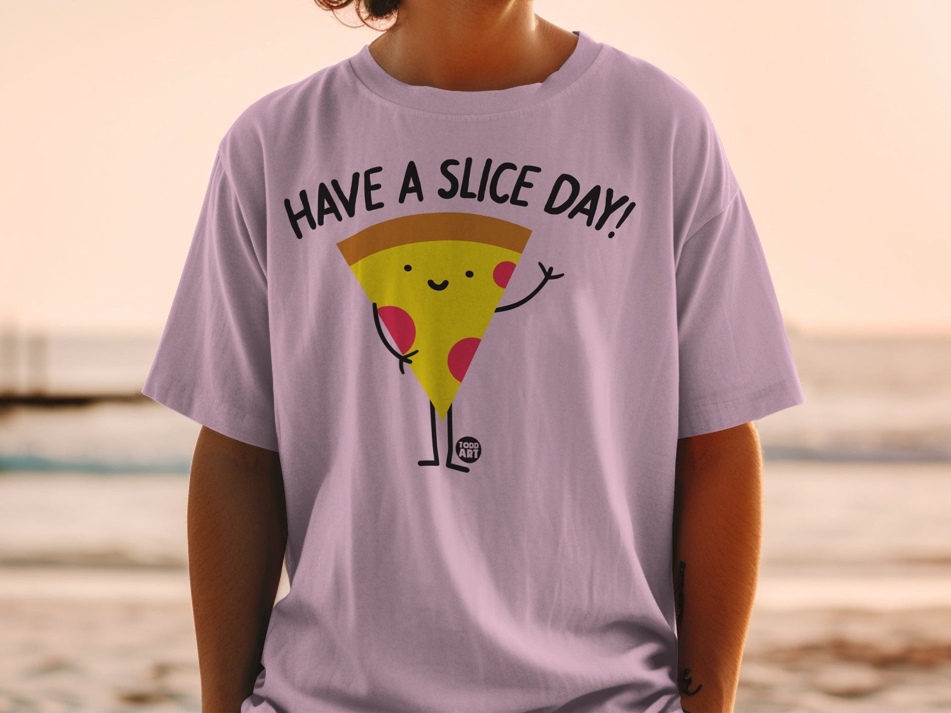 T-shirt with cartoon pizza slice saying "HAVE A SLICE DAY!".