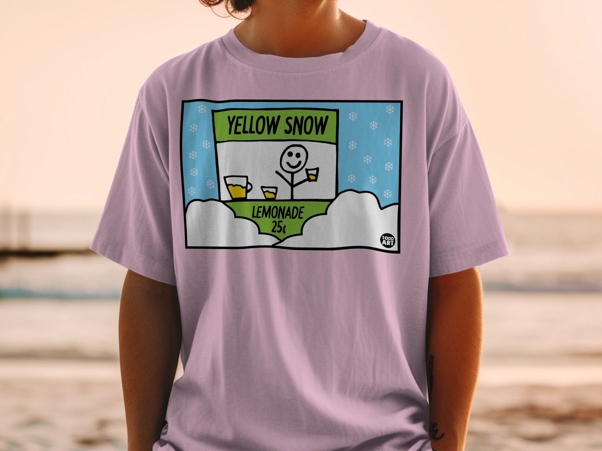T-shirt with cartoon of a smiling person selling lemonade for 25 cents.