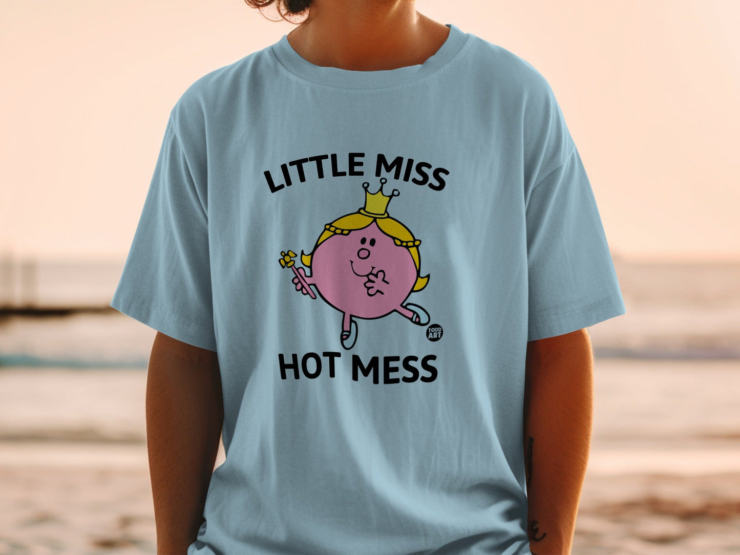 Light blue t-shirt with "Little Miss Hot Mess" and character illustration.