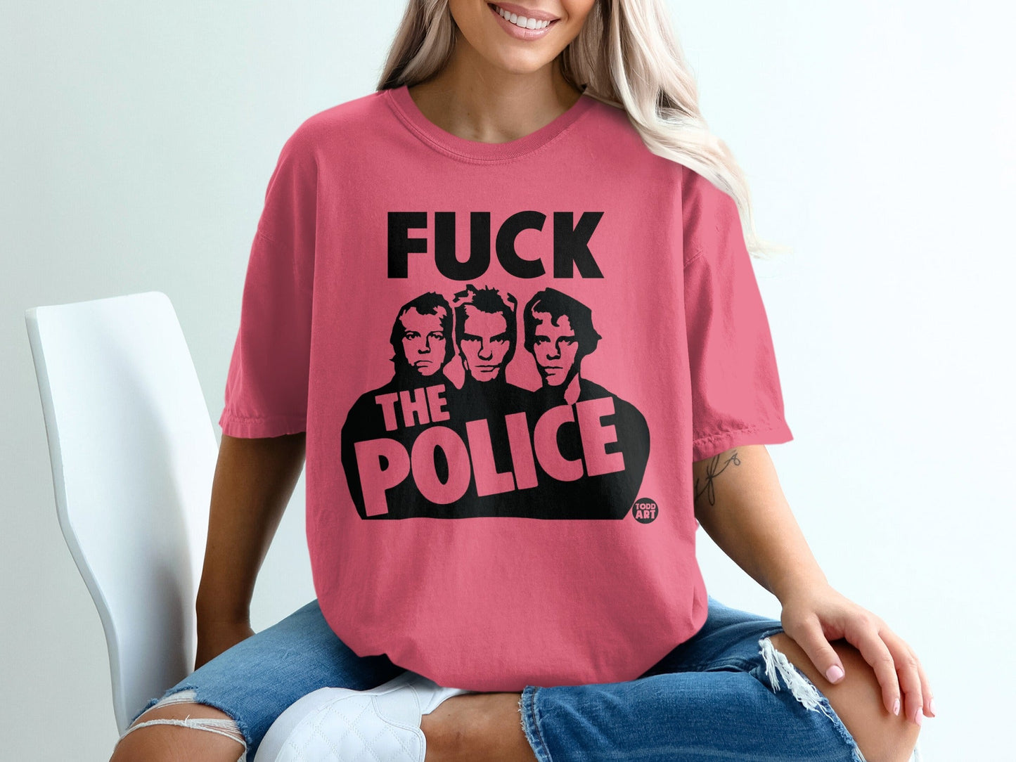 The Police band members on a pink t-shirt.