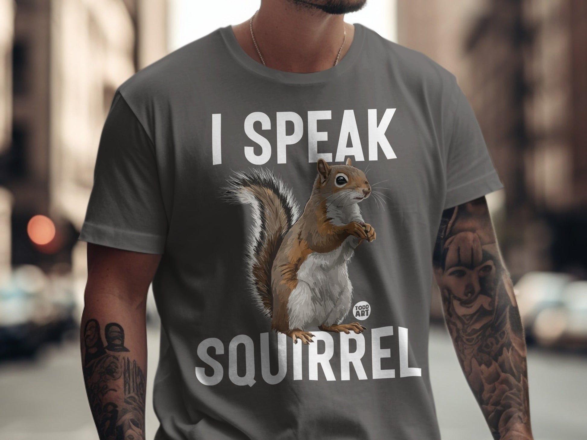 Grey t-shirt with "I SPEAK SQUIRREL" and a squirrel graphic.