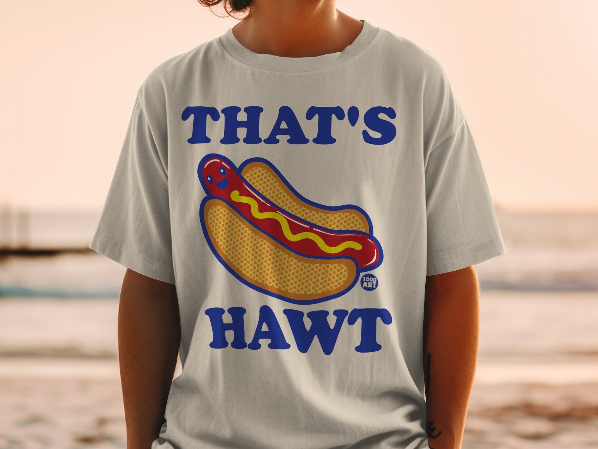 T-shirt with "THAT'S HAWT" and a cartoon hot dog graphic.