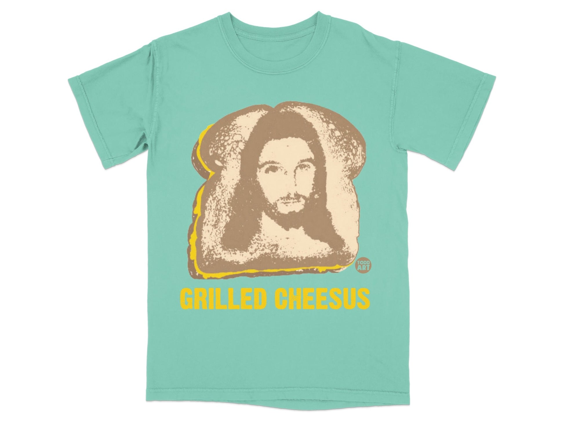 Turquoise t-shirt with "Grilled Cheesus" text and Jesus on toast graphic.