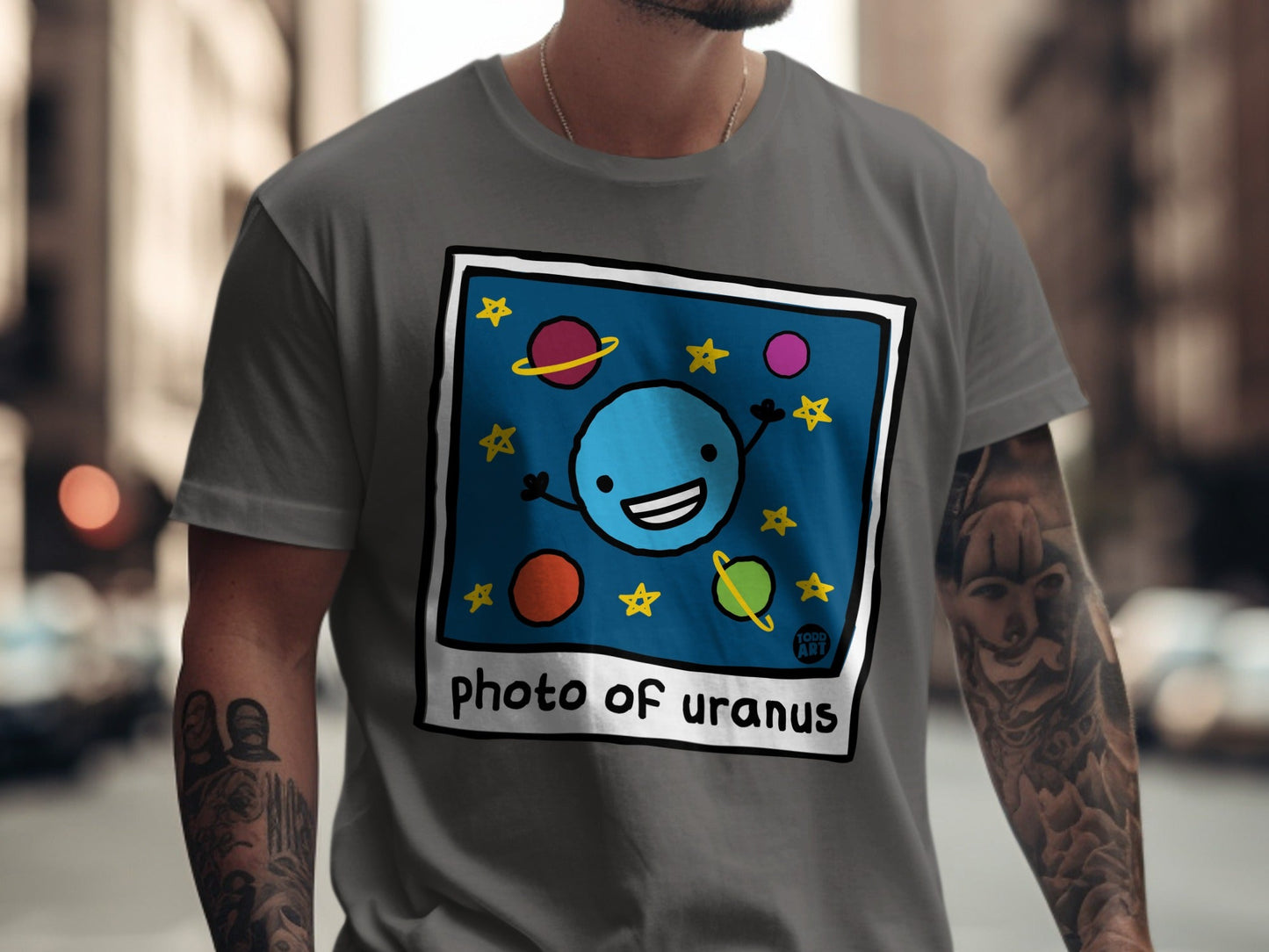Cartoon blue planet with stars and text "photo of uranus".