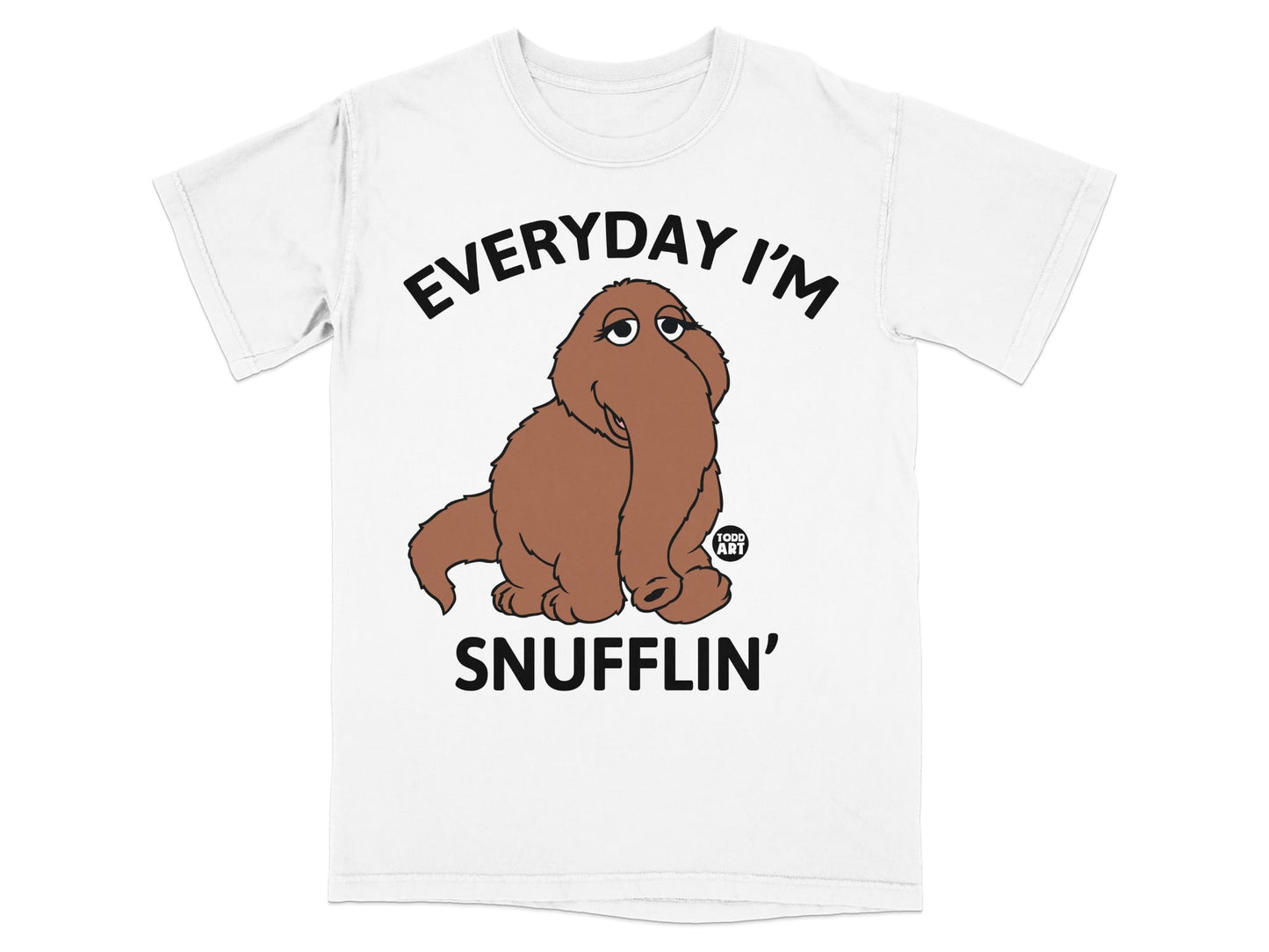 Brown fuzzy creature on a white t-shirt with text "EVERYDAY I'M SNUFFLIN'".