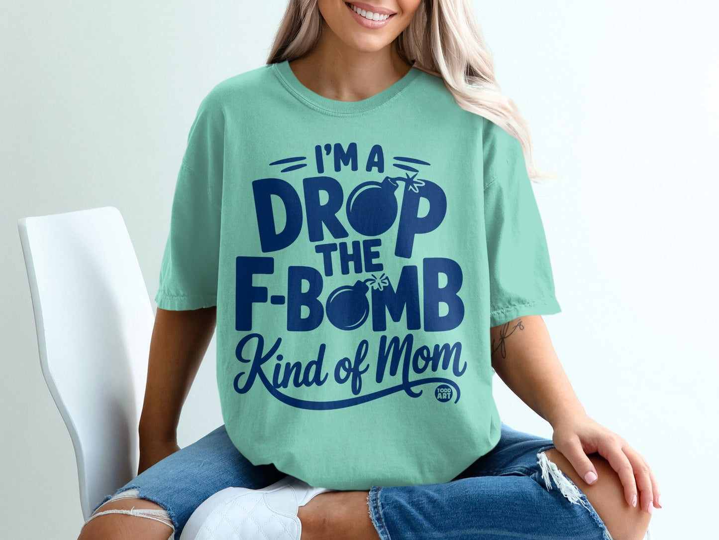 Mint t-shirt with "I'm the drop the F-bomb kind of mom" text.