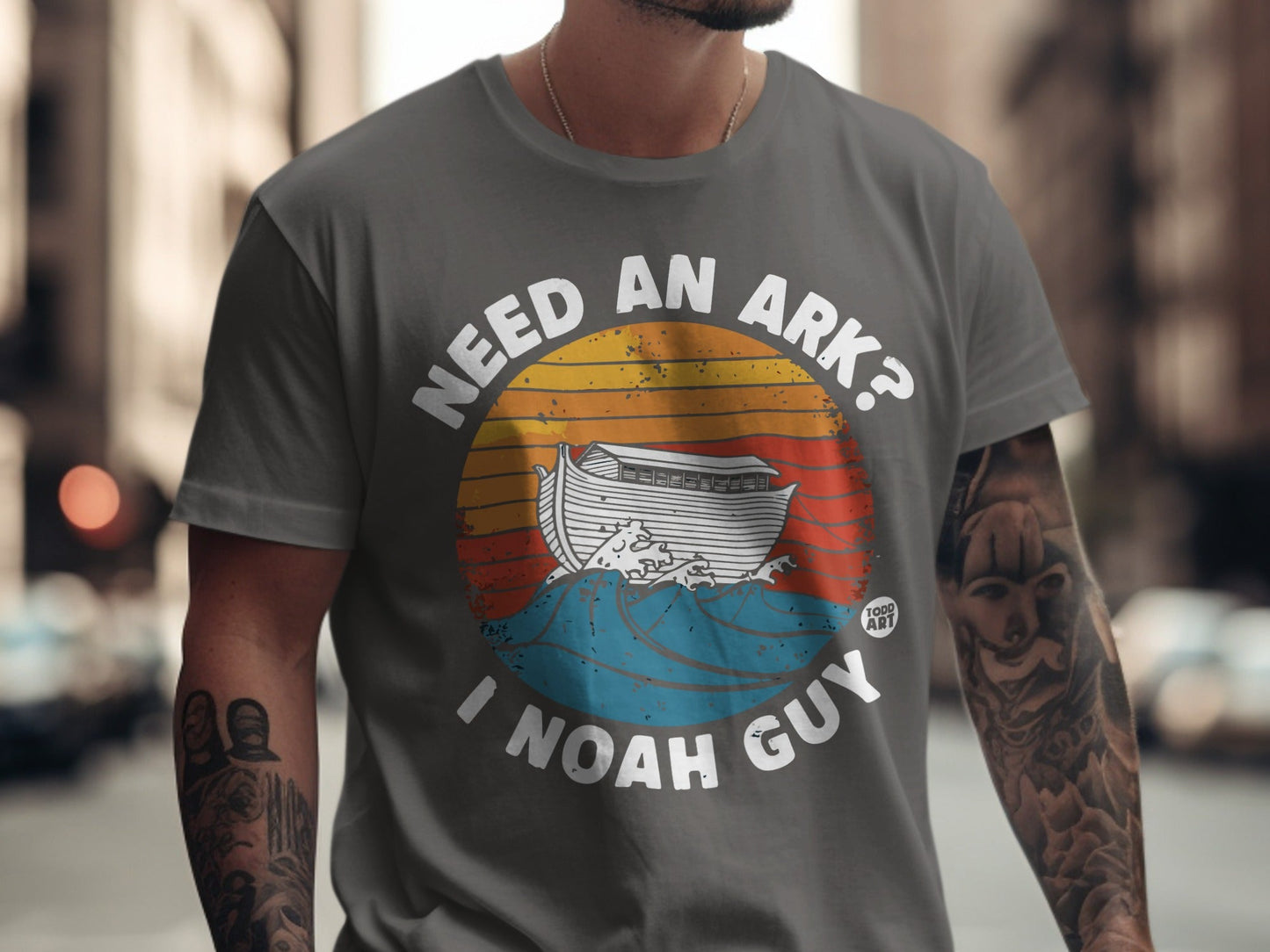 T-shirt with "NEED AN ARK? I NOAH GUY" and an illustration of Noah's Ark.