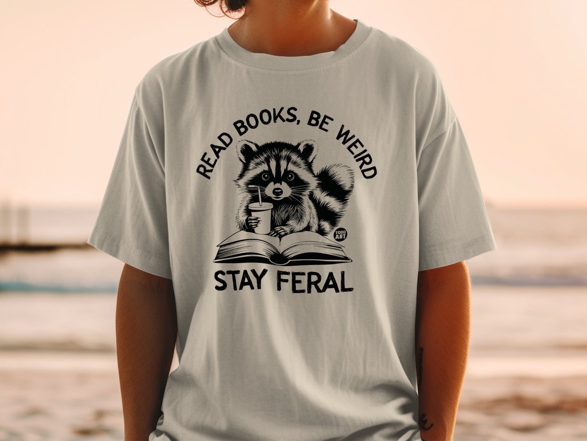 Read Books Be Weird Stay Feral Graphic T-Shirt