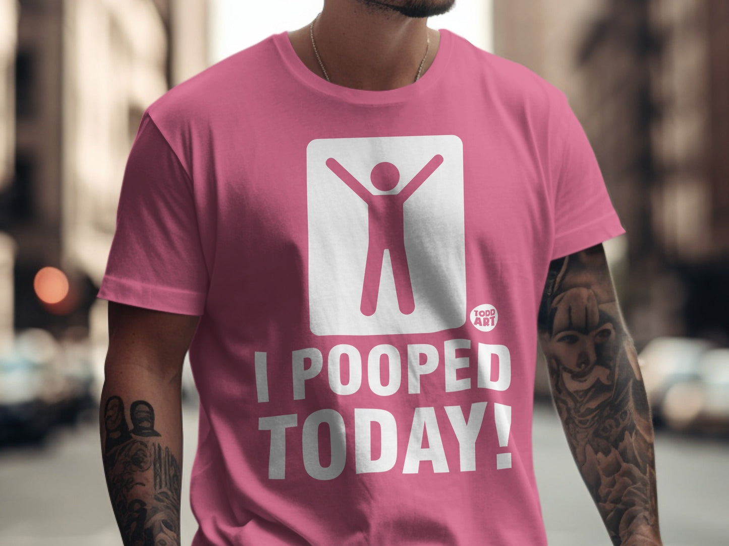 Pink t-shirt with white graphic and text "I POOPED TODAY!".