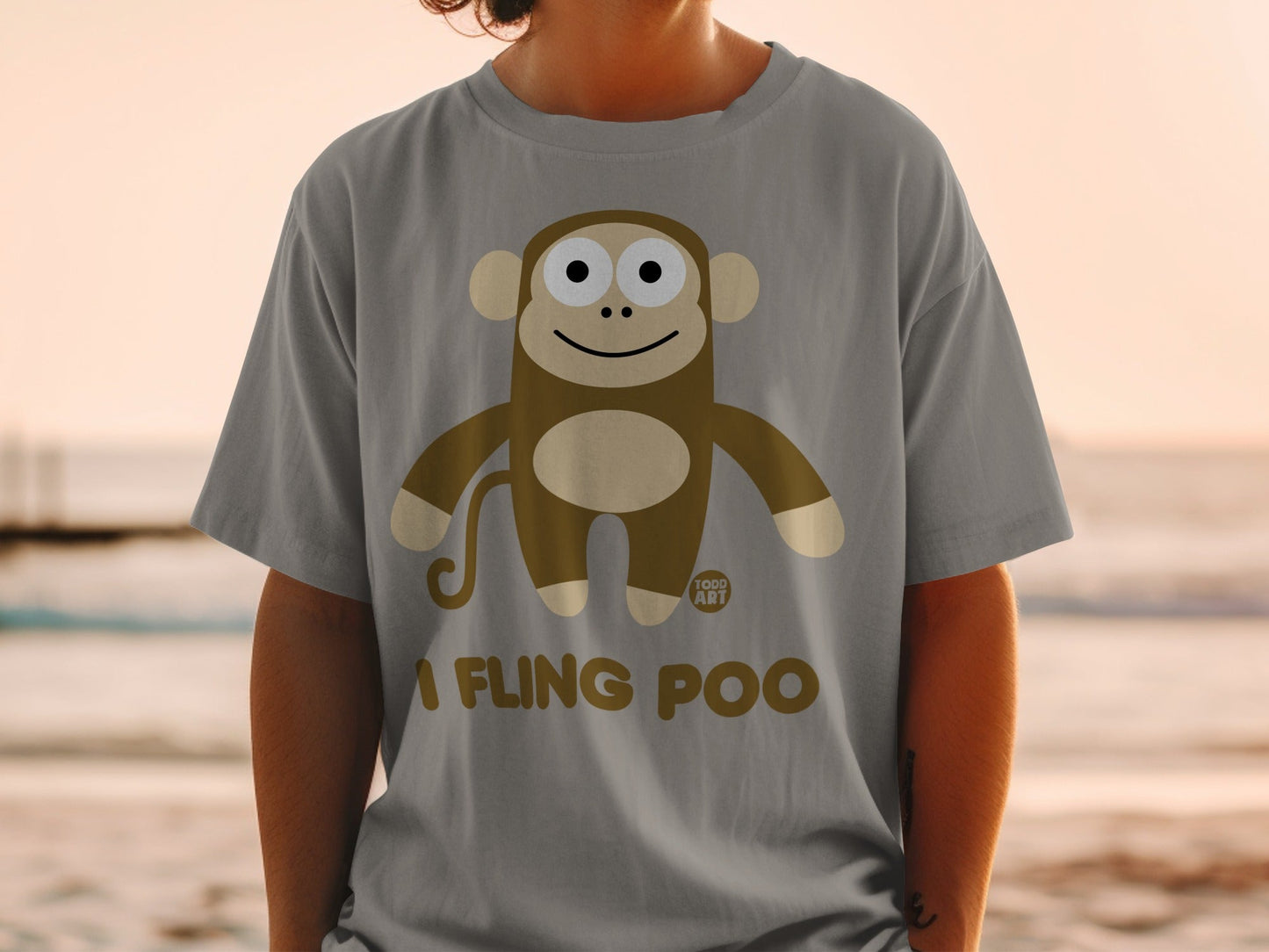 Brown monkey graphic with "I FLING POO" text on a gray t-shirt.