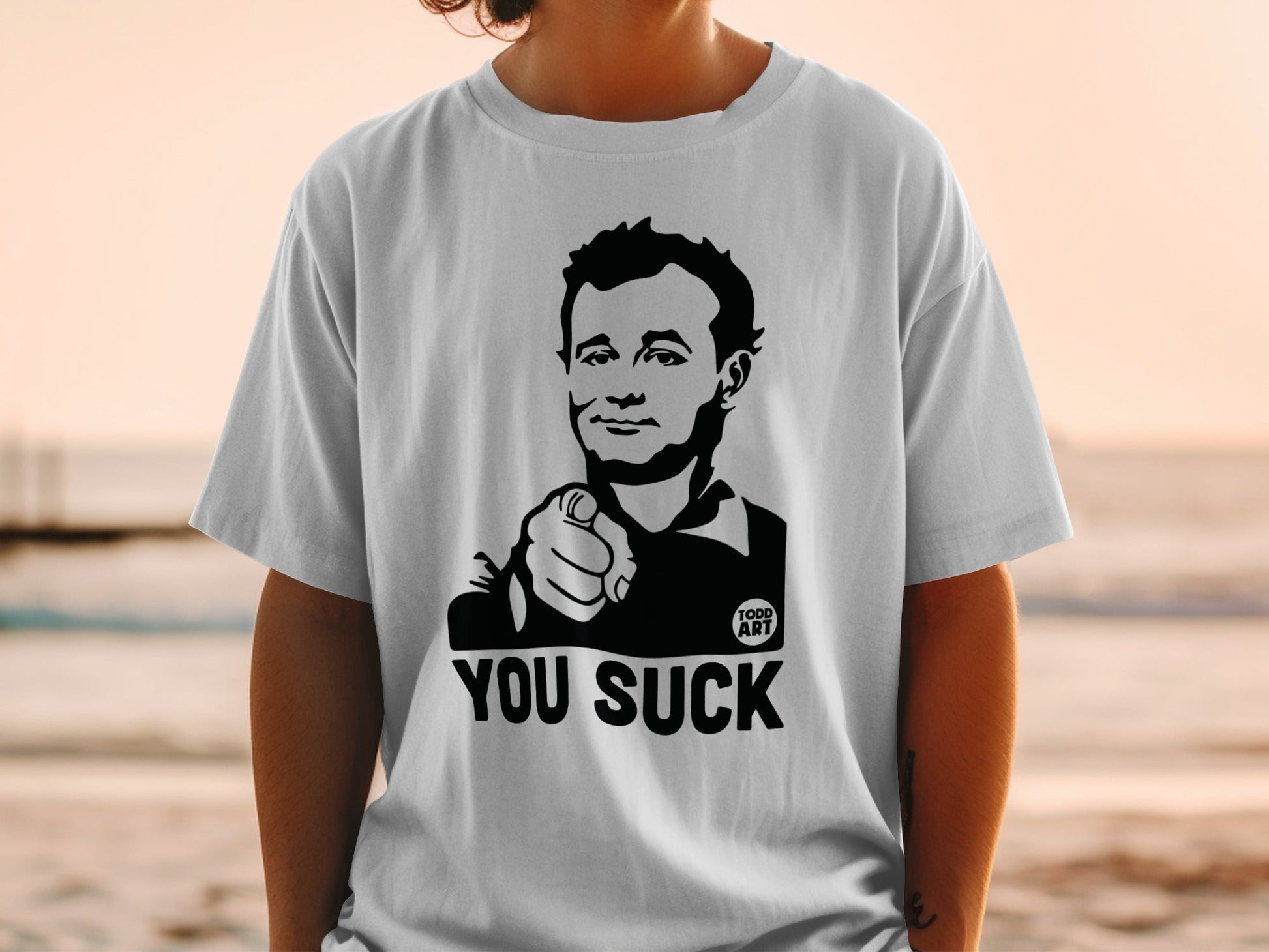 T-shirt with Bill Murray pointing and "YOU SUCK" text.